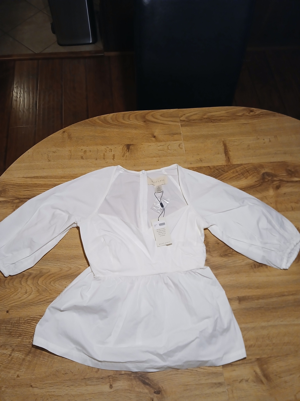 Women's White V-Neck Peplum Blouse with Elastic Waist
